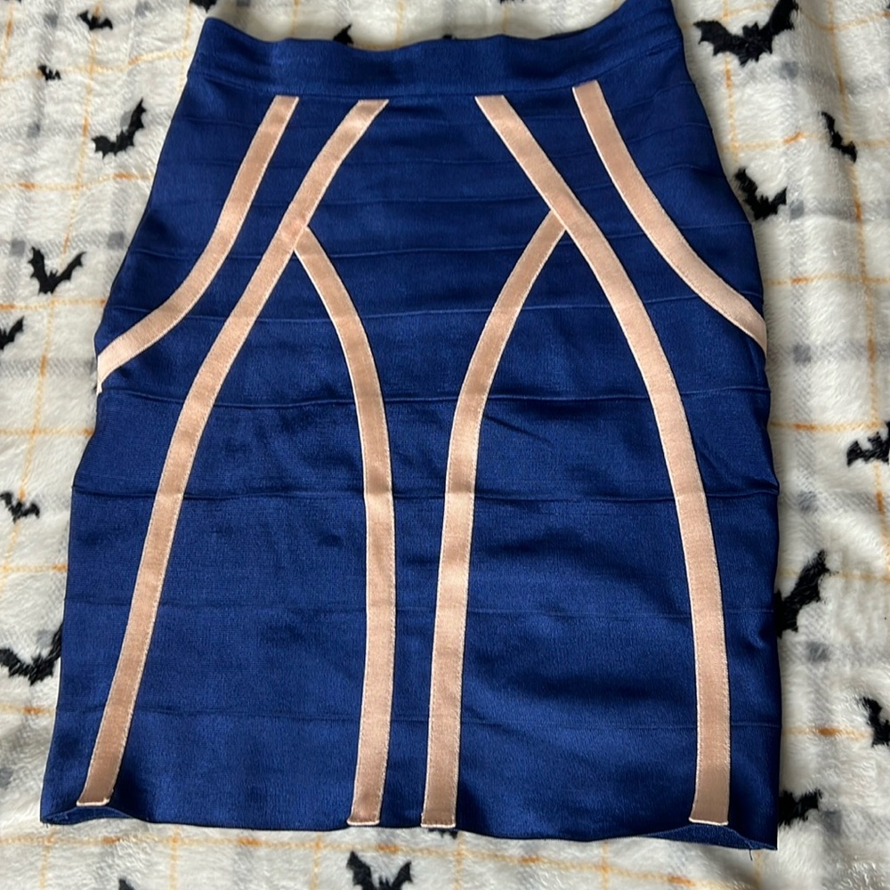 Skirt it’s an XS blue and light pink